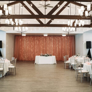 A beautifully decorated venue interior for a wedding